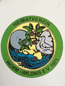 Die Grafik zeigt das Logo des Heimatvereins Worm-Wildnis E.V.1971